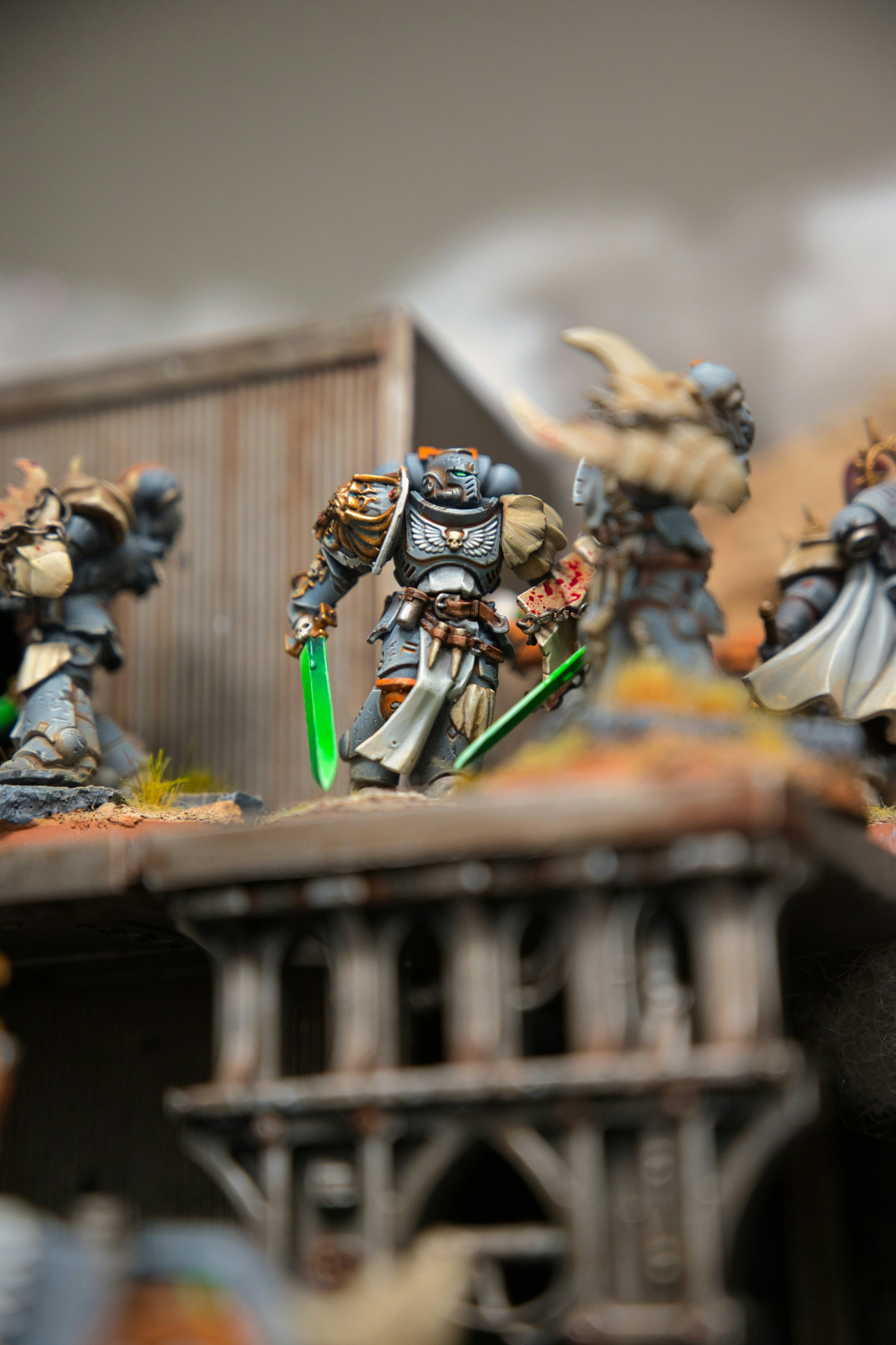 Painted Warhammer miniatures arranged on a tabletop battlefield
